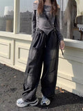 Schwarze Gothic-Jeans mit weitem Bein und Cargo-Taschen