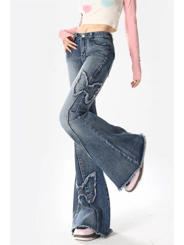 Vintage 90er Flared Jeans mit Low Waist & Rissen