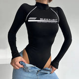 **Kreative Bodysuits für alternative Fashion: Schwarzes Casual Bodysuit mit „Believe in Light“-Aufdruck**