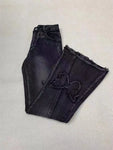 Vintage 90er Flared Jeans mit Low Waist & Rissen