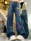 Hoch taillierte Graffiti-Jeans für 90er Jahre mode