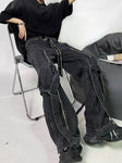 Schwarze grunge Jean mit Reißverschlüssen und Nieten